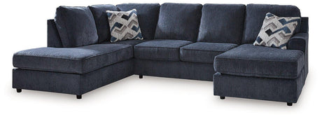 Ashley Furniture Albar Place sectional sofa with plush cushions and modern design, shown in a spacious living room setting.