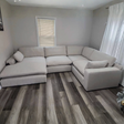 Ashley Furniture Atlas Cloud corner sectional with chaise, 4-piece sofa set, featuring plush cushions and modern design.