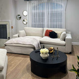 Left-facing Ashley Furniture Atlas Cloud sectional with chaise, featuring plush gray upholstery and modern design.
