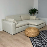 Ashley Furniture Atlas Cloud sectional with chaise, 2-piece fabric sofa set showing plush cushions and left-facing chaise.