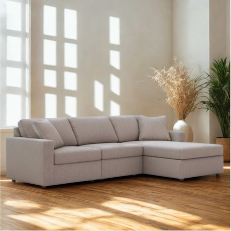 Ashley Furniture Modmax sectional sofa with right-facing chaise, three-piece living room set, in oyster fabric with plush cushions.