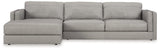 Ashley Furniture Amiata sectional with chaise, featuring plush fabric upholstery and modern design, shown in a stylish living room setting.