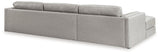 Ashley Furniture Amiata sectional with chaise, featuring plush upholstery and modern design, shown in a stylish living room setting.