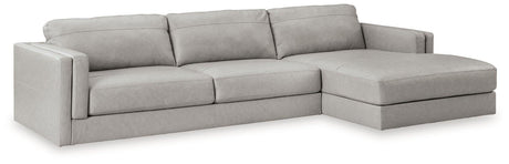 Ashley Furniture Amiata sectional with chaise, featuring plush fabric and modern design for comfortable living space.