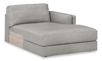 Ashley Furniture Amiata sectional with chaise, showing plush fabric upholstery and modern design in a spacious living room setting.