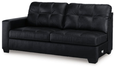 Ashley Furniture Barlin Mills sectional with chaise, showing a modern fabric sofa with a spacious chaise lounge in a stylish living room setting.