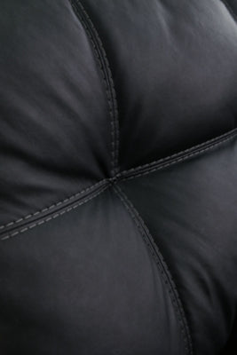 Ashley Furniture Barlin Mills sectional with chaise featuring tufted stitch detail in a modern living room setting.