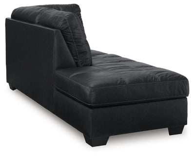 Ashley Furniture Barlin Mills sectional with chaise, showing a stylish fabric sofa with a chaise lounge in a modern living room setting.