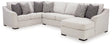 Ashley Furniture Koralynn sectional with chaise, showing plush fabric, modern design, and spacious seating arrangement.