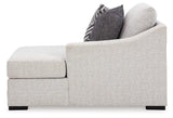 Ashley Furniture Koralynn sectional with chaise, featuring plush upholstery and modern design in a cozy living room setting.