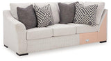 Ashley Furniture Koralynn sectional with chaise featuring plush cushions and modern design in a cozy living room setting.