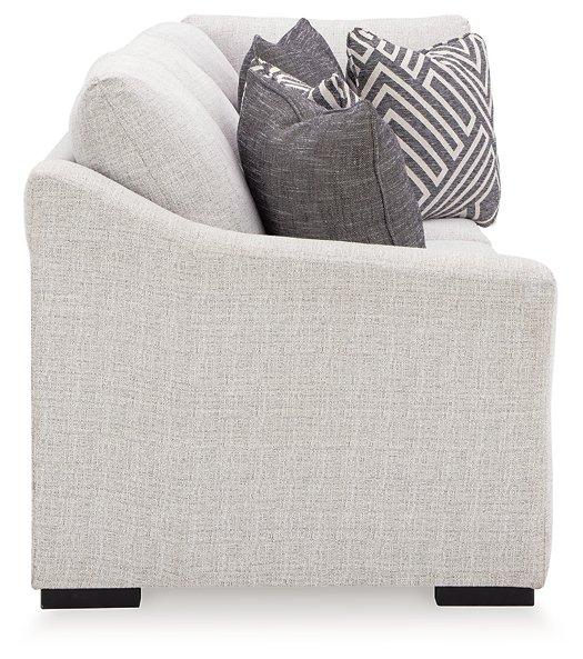 Ashley Furniture Koralynn sectional with chaise, featuring plush upholstery and modern design in a cozy living room setting.