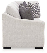 Ashley Furniture Koralynn sectional with chaise, featuring plush upholstery and modern design in a cozy living room setting.