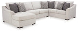 Ashley Furniture Koralynn sectional with chaise, featuring plush cushions and modern design, shown in a cozy living room setting.