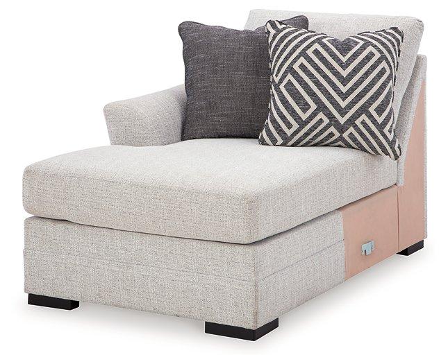 Ashley Furniture Koralynn sectional with chaise showing plush fabric, modern design, and spacious seating in a living room setting.