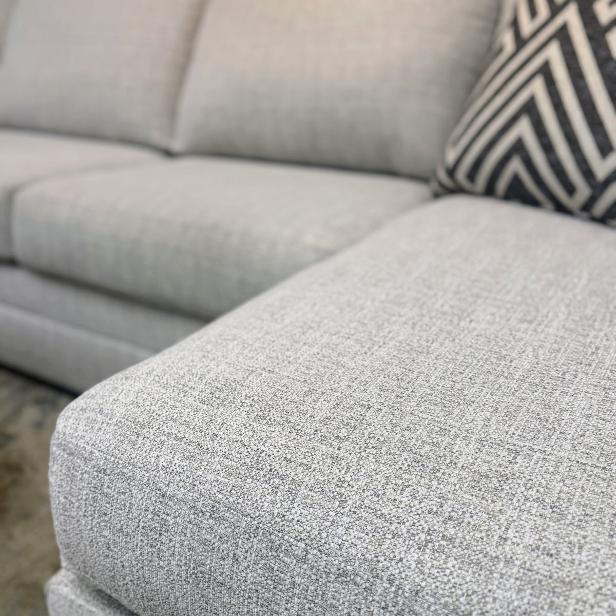 Ashley Furniture Koralynn sectional with chaise, featuring plush upholstery and modern design, shown in a stylish living room setting.