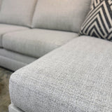 Ashley Furniture Koralynn sectional with chaise, featuring plush upholstery and modern design, shown in a stylish living room setting.
