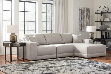 Next-Gen Gaucho Sectional Sofa with Chaise by Ashley Furniture, showcasing plush upholstery and modern design in a spacious living room setting.