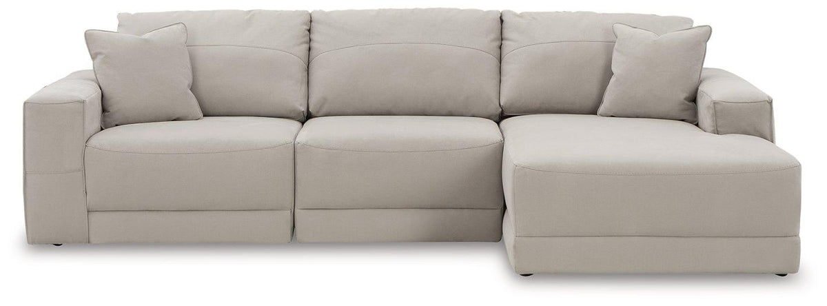 Ashley Furniture Next-Gen Gaucho sectional sofa with chaise, featuring plush cushions and modern design in a spacious living room setting.