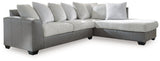 Ashley Furniture Clairette sectional with chaise, featuring plush upholstery and modern design, shown in a spacious living room setting.