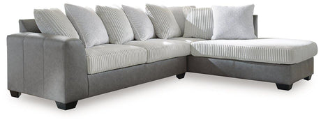 Ashley Furniture Clairette sectional with chaise, featuring plush upholstery and modern design, shown in a spacious living room setting.