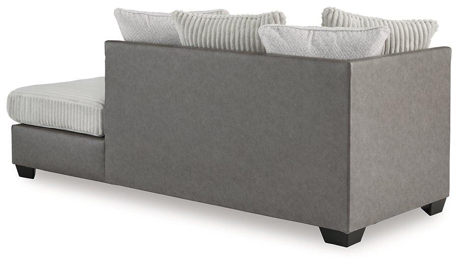 Ashley Furniture Clairette sectional with chaise, showcasing plush fabric and modern design in a stylish living room setting.