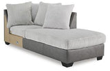 Ashley Furniture Clairette Court Sectional with chaise showing plush fabric, modern design, and spacious seating arrangement.