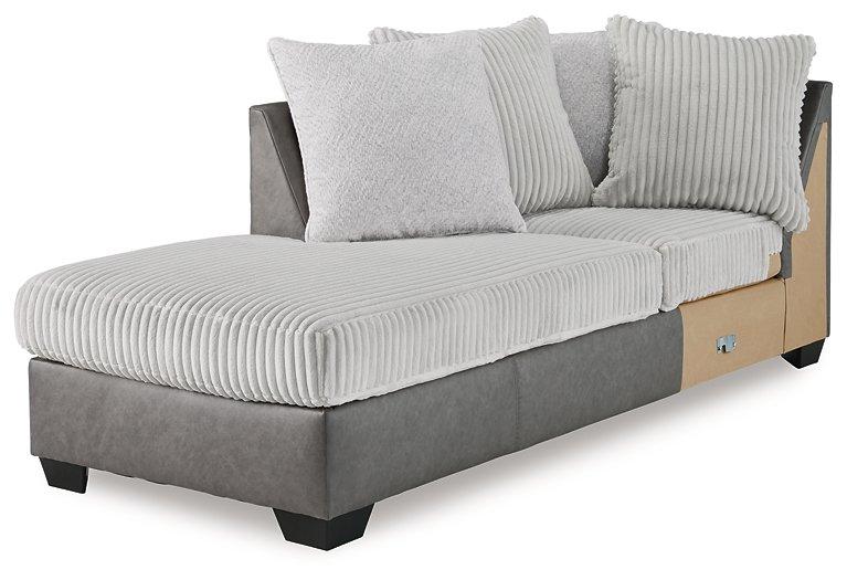 Ashley Furniture Clairette sectional with chaise, showing plush fabric upholstery and modern design in a spacious living room setting.