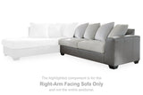 Ashley Furniture Clairette sectional with chaise, shown in a modern living room setting, featuring neutral upholstery and plush cushions.