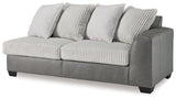 Ashley Furniture Clairette sectional with chaise, featuring neutral fabric upholstery and plush cushions for comfortable seating.