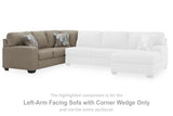 Ashley Furniture Newellen sleeper sectional with chaise, featuring plush upholstery and modern design in soft fabric.
