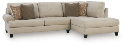Ashley Furniture Steelwater Retreat sectional with chaise, featuring plush cushions and stylish upholstery for a modern living room.