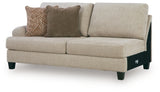Ashley Furniture Steelwater Retreat sectional with chaise, showing plush gray fabric and modern design from an angled view.