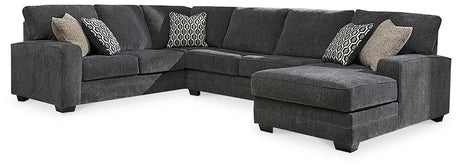 Ashley Furniture Tracling 3-piece sectional with chaise, featuring plush cushions and modern design for comfortable living space.