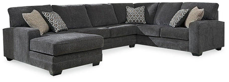 Ashley Furniture Tracling 3-Piece Sectional with Chaise showing plush fabric, modern design, and spacious seating arrangement.