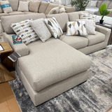 Silverwood sectional sofa with right chaise from Ashley Furniture, featuring plush cushions and modern design.