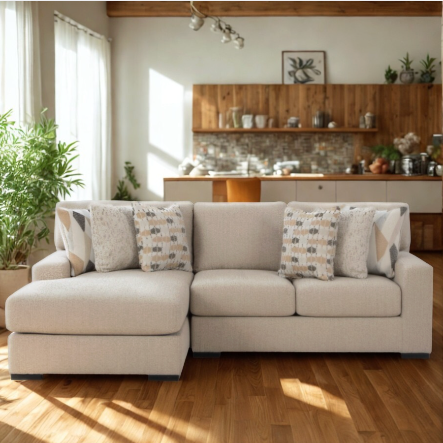 Ashley Furniture Silverwood sectional sofa with a right chaise, upholstered in silver fabric, showcasing a modern living room setup.