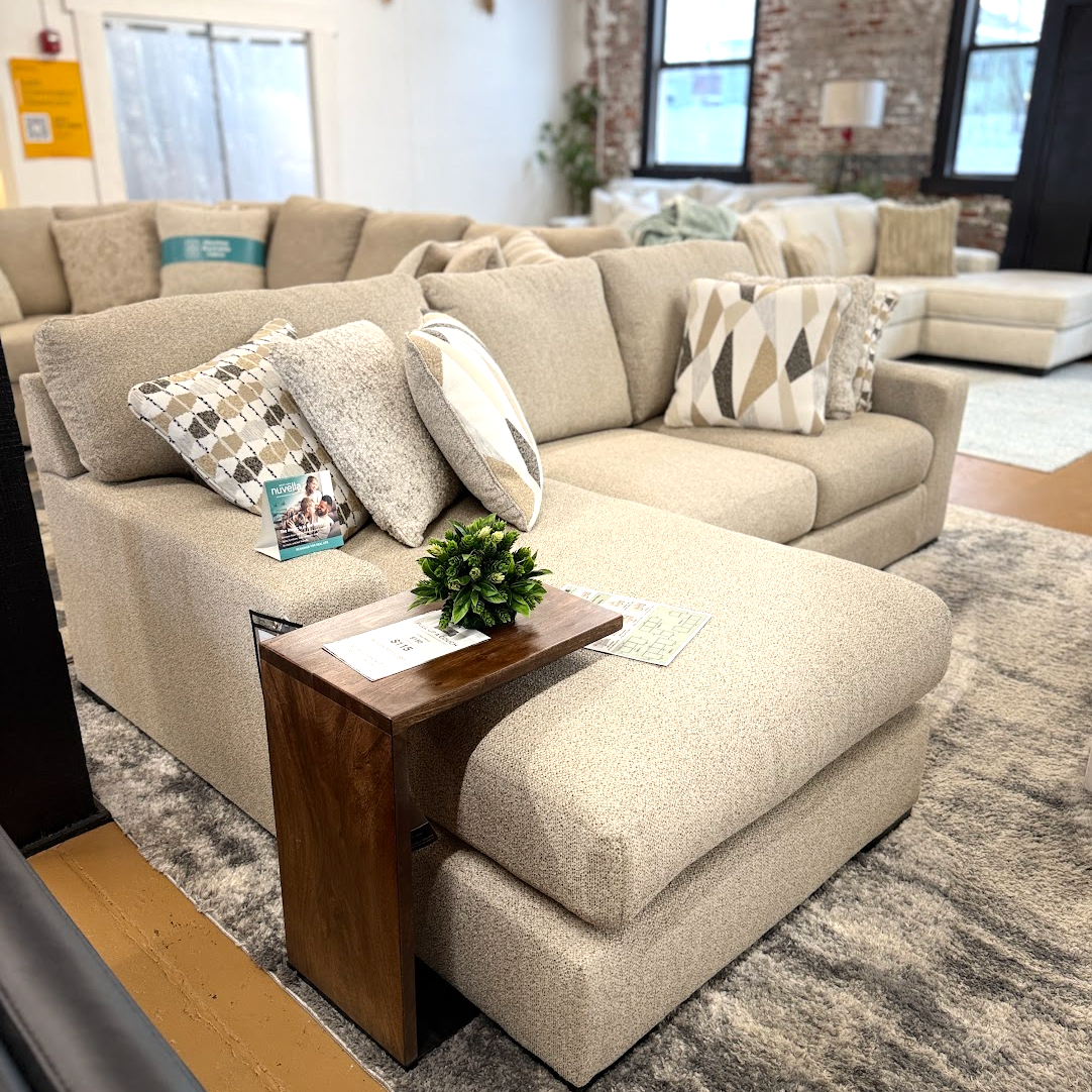 Silverwood sectional sofa with right chaise by Ashley Furniture, featuring plush cushions and modern design.