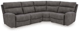 Ashley Furniture Next-Gen DuraPella power reclining sectional with plush cushions and modern design, shown in a spacious living room.