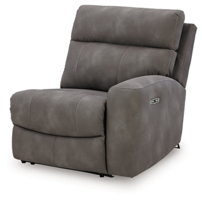 Ashley Furniture Next-Gen DuraPella power reclining sectional shown from an angled view with plush cushions and dark fabric upholstery.