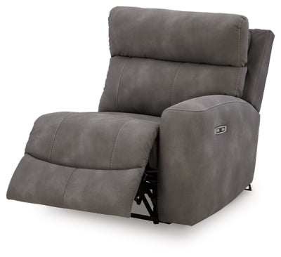 Ashley Furniture Next-Gen DuraPella Power Reclining Sectional shown from an open angle, featuring plush cushions and modern design.