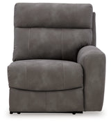 Ashley Furniture Next-Gen DuraPella Power Reclining Sectional with plush cushions and modern design, view from head-on angle.