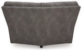 Ashley Furniture Next-Gen DuraPella power reclining sectional with plush fabric and multiple seating options, viewed from the back.