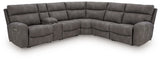 Ashley Furniture Next-Gen DuraPella power reclining sectional with plush cushions and modern design, shown in a spacious living room setting.