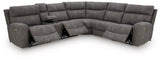 Open view of Ashley Furniture Next-Gen DuraPella power reclining sectional with plush cushions and modern design.