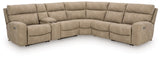Ashley Furniture Next-Gen DuraPella power reclining sectional with plush cushions and a modern design, shown in a cozy living room setting.