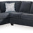 Ashley Furniture Altari sectional with chaise, showcasing plush upholstery and modern design in a spacious living room setting.