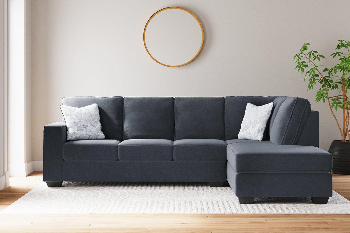 Ashley Furniture Altari sectional with chaise showcasing plush fabric and modern design in a spacious living room setting