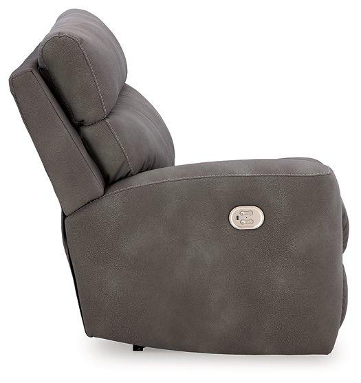 Ashley Furniture Next-Gen DuraPella power reclining sectional loveseat with built-in console and plush cushions, in a modern fabric.