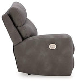 Ashley Furniture Next-Gen DuraPella power reclining sectional loveseat with built-in console and plush cushions, in a modern fabric.